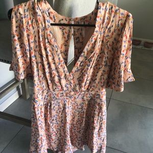 Brand new Free People romper, size 2